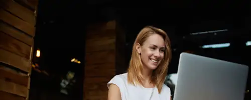 Woman looking at laptop