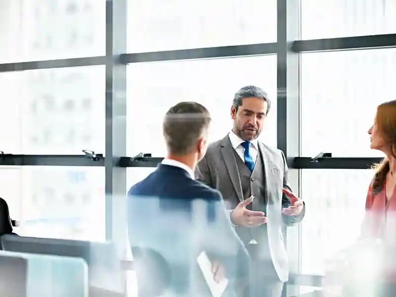 Business people discussing a project.